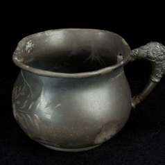 Small engraved pewter cup